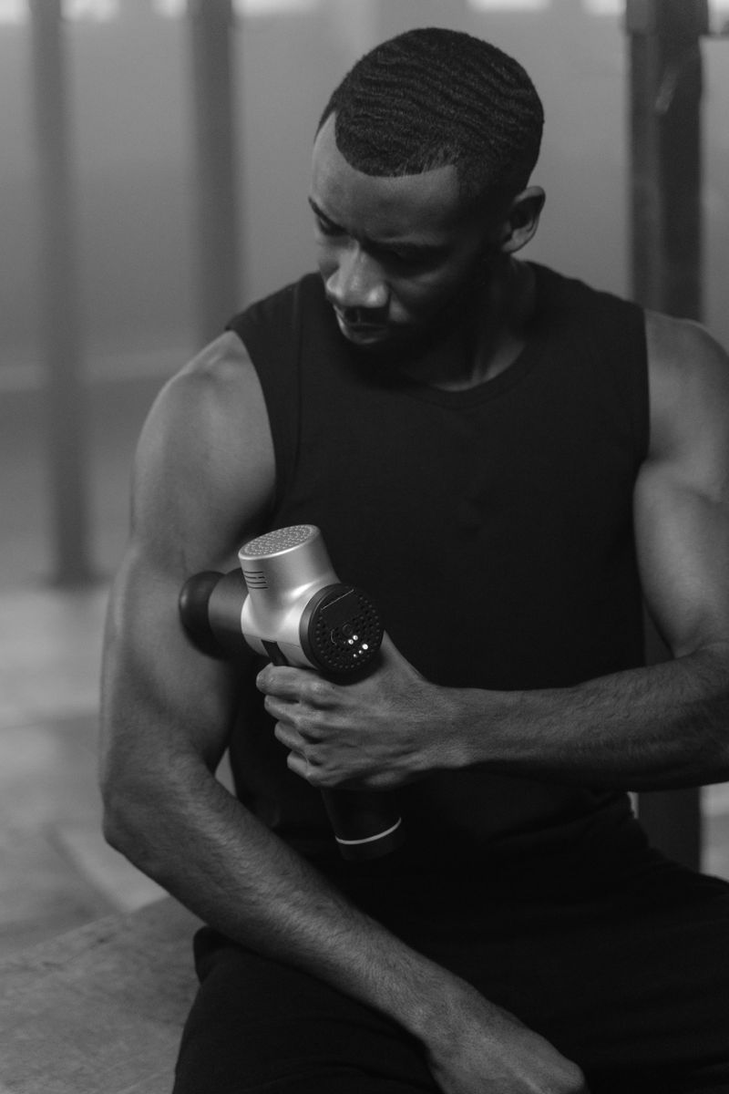 Post-Workout Recovery in Your Palm — Mini Percussion Massage Gun